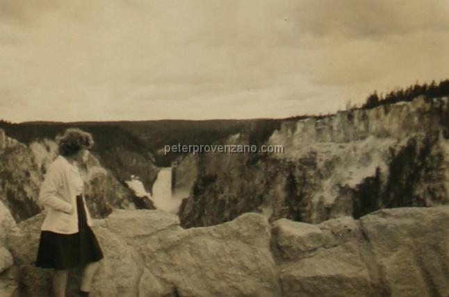 Peter Provenzano Photo Album Image_copy_167.jpg - Unkown woman overlooking the Lower Falls of the Yellowstone River. Yellowstone National Park, 1942.
Peter and Fay Provenzano vacationed at Yellowstone National Park while driving across the United States from Chicago, Illinois to Scramento, California.